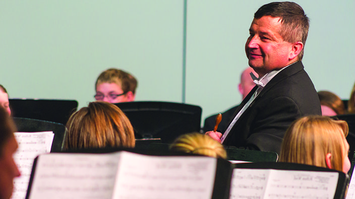 Calvin Hofer directs the CMU Wind Symphony during the Best of the West music festival